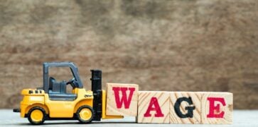 Yellow Forklift Truck with W.A.G.E blocks